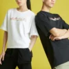 Camisola desportiva de malha larga de manga curta branca com estampado Converse para homem