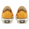 Chuck 1970s em couro com cores sazonais “Amarelo Branco”