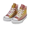 Chuck Taylor All Star com plataforma elevada em EVA “Citrus Glitz”
