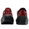 Chuck Taylor All Star com salto em relevo e tiras cruzadas “Rottin Apple”