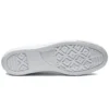 Chuck Taylor All Star Couro Ox “Branco”