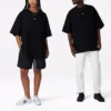 Cor sólida, corte largo, gola redonda, manga curta, estilo para casal, preto