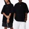 Cor sólida, corte largo, gola redonda, manga curta, estilo para casal, preto